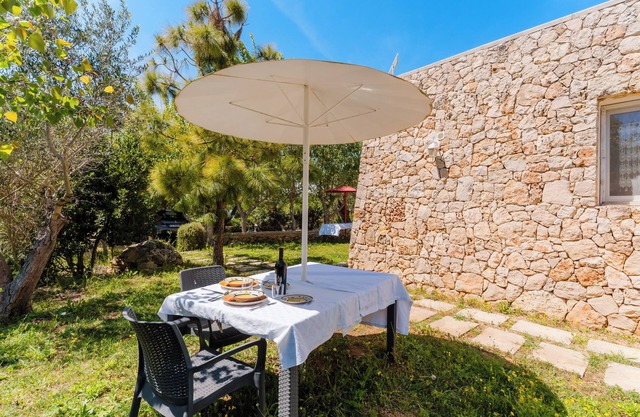 Apartamento 'Confort Dépendance Angolo Cottura' con piscina compartida, Wi-Fi y aire acondicionado
