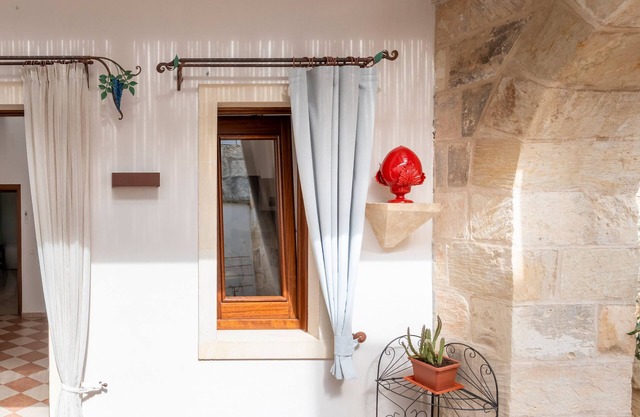 Apartamento 'Corte Curatolo - Ciuri' con terraza compartida, Wi-Fi y aire acondicionado.