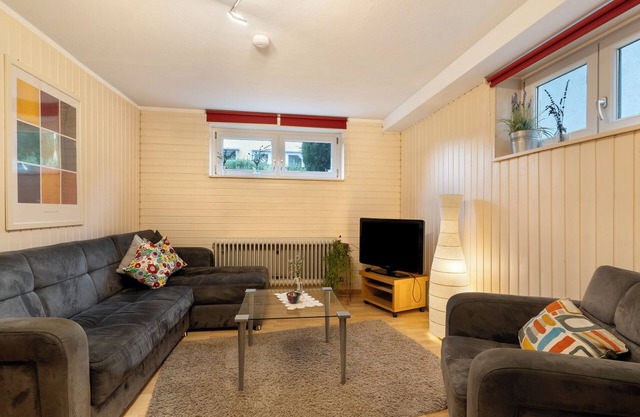 Apartamento 'Die Kleine Ferienwohnung' con jardín compartido, Wi-Fi y aire acondicionado.