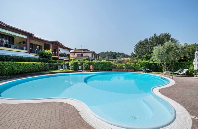 Apartamento 'Dimora Del Lago - Oasi Con Piscina' con piscina compartida, Wi-Fi y aire acondicionado.
