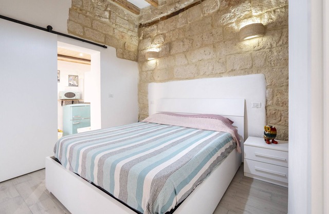Apartamento 'Dimora Donna Lucrezia' con balcón y aire acondicionado