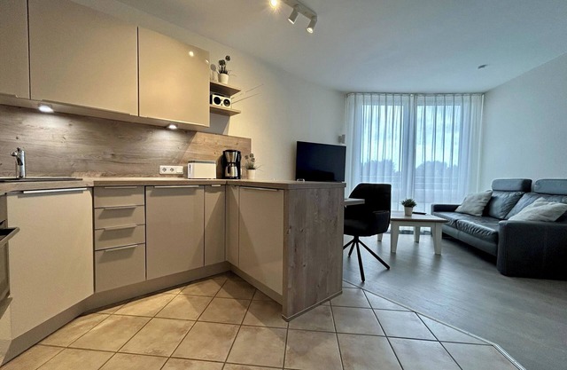 Apartment directly behind the dike for 2 persons, swimming pool, whirlpool, sauna