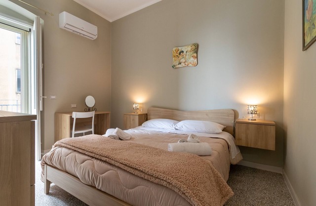 Apartamento 'Dormiamoci Sù' con balcón, Wi-Fi y aire acondicionado
