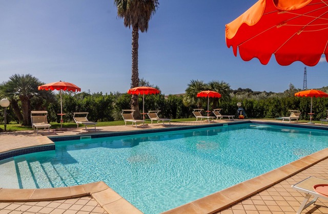 Apartamento 'Farfalla' con piscina compartida, Wi-Fi y aire acondicionado