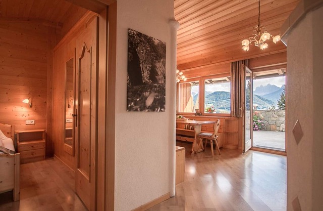 Apartamento para 2-4 personas con una gran terraza y sauna, así como una estufa de azulejos.