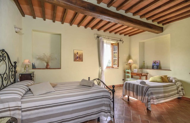 Apartamento 'Granaio' con piscina compartida, jardín privado y Wi-Fi