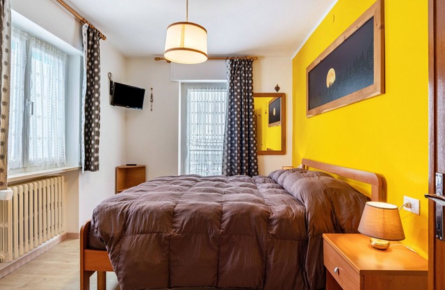 Apartamento "House Cuel Milena Folgaria - Yellow" con vistas a la montaña y jardín compartido
