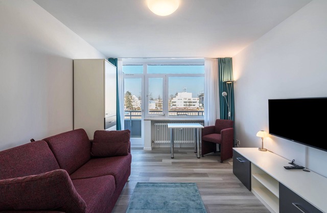 Apartamento 'Huber Living Single Plus 110' con balcón y Wi-Fi