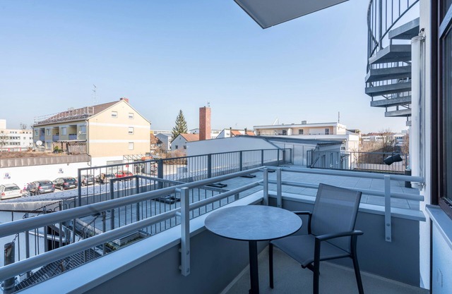 Apartamento 'Huber Living Single Plus 305' con balcón y Wi-Fi