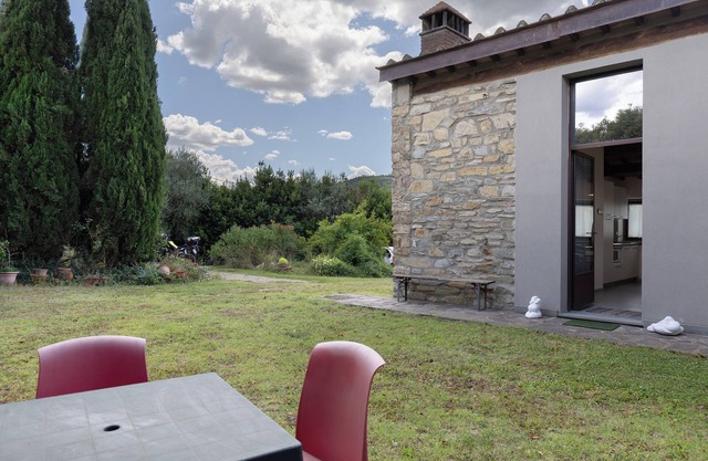 Apartamento 'I Cipressi' con jardín compartido, Wi-Fi y aire acondicionado