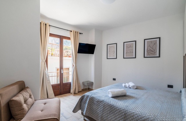Apartamento 'Il Filo Azzurro 2' con vistas al mar, Wi-Fi y aire acondicionado