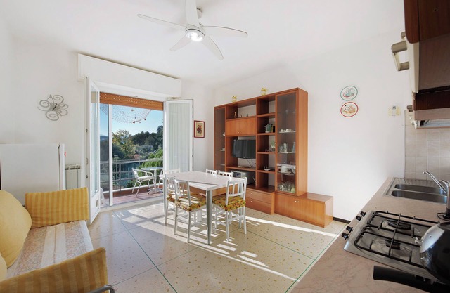 Apartamento 'Il Corallo' con jardín y balcón compartidos