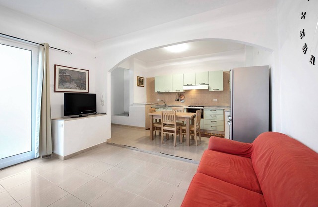Apartamento 'Il Porto' con terraza privada, jardín privado y Wi-Fi