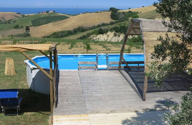 Apartamento en villa con WIFI, bañera de hidromasaje, piscina, A/C, TV, patio, vista panorámica