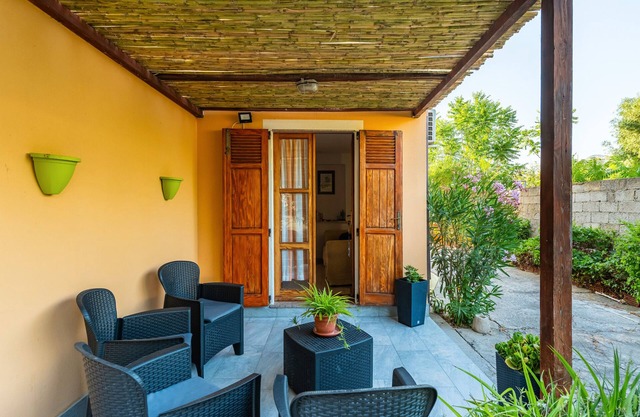 Apartamento 'Nonna Tere' con jardín privado y aire acondicionado