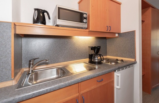 Apartment Kampenwand Wohn- und Schlafraum mit Balkon, 26 qm, Aufzug im Haus