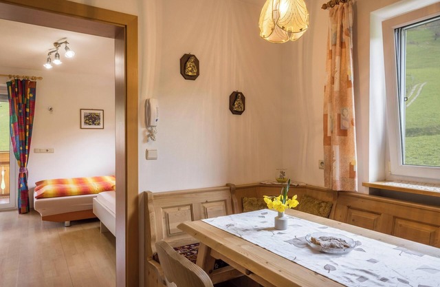 Apartamento "Kirchblick" cerca de zonas de esquí y senderismo con vistas a la montaña y jardín