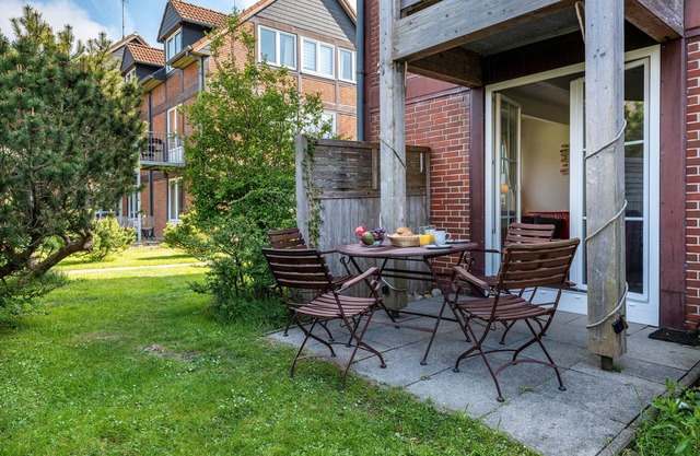 Apartamento 'Kleine Ella Pellworm' con terraza privada, jardín compartido y Wi-Fi