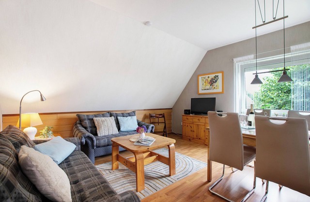 Apartamento 'Kleine Ferienwohnung' con jardín y balcón compartidos