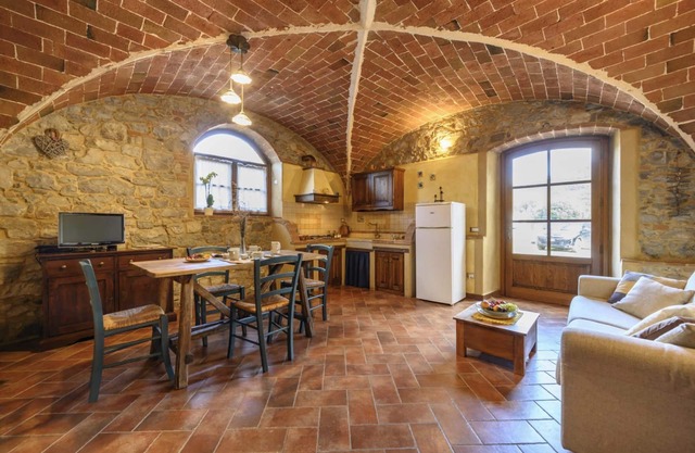 Apartamento 'La Caciaia' con piscina compartida, jardín privado y Wi-Fi