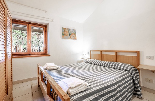 Apartamento 'La Capannuccia C' con jardín compartido, Wi-Fi y aire acondicionado