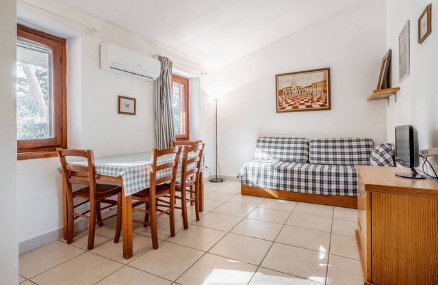 Apartamento 'La Capannuccia A' con jardín compartido, Wi-Fi y aire acondicionado