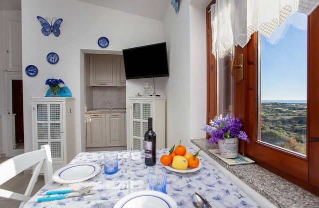 Apartamento "La Finestra sul Mare" con vistas al mar, terraza privada y Wi-Fi