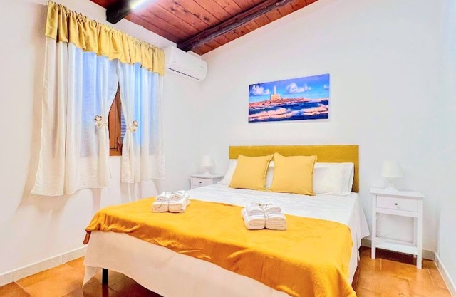Apartamento 'La Mignola - Bilo 2 - Duplicado' con Jardín Compartido, Wi-Fi y Aire Acondicionado