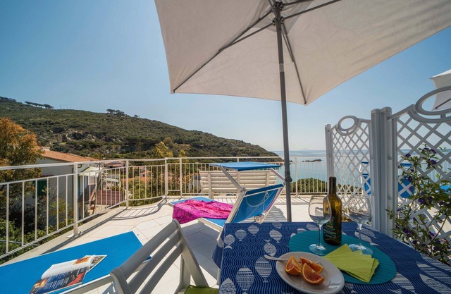 Apartamento 'Le Sirene Mono 9' con terraza compartida, Wi-Fi y aire acondicionado