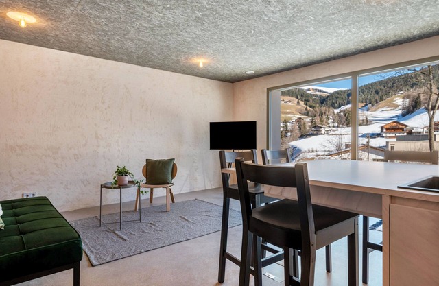 Apartamento 'Lena Dolomites Gartensuite' con vistas a la montaña, terraza privada y Wi-Fi