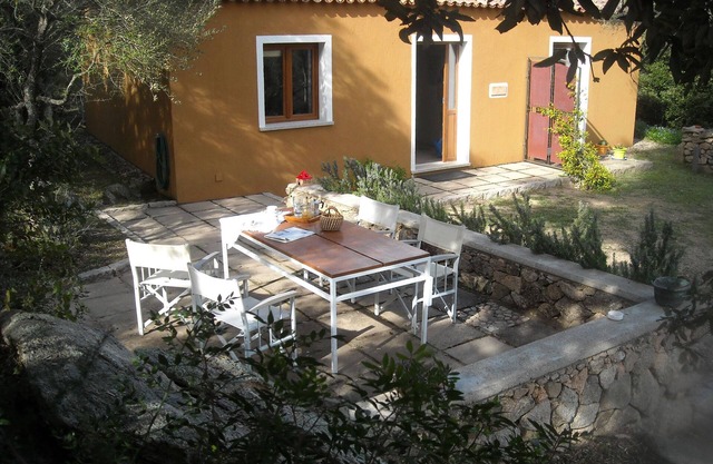 Apartamento 'Li Licci' con piscina compartida, terraza privada y aire acondicionado