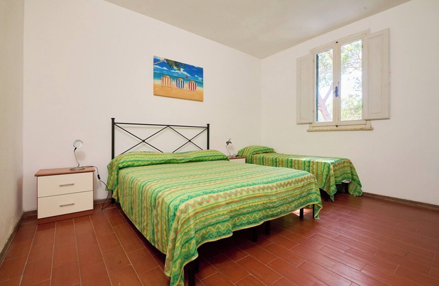 Apartamento 'Mare Etrusco 2' con jardín compartido y Wi-Fi