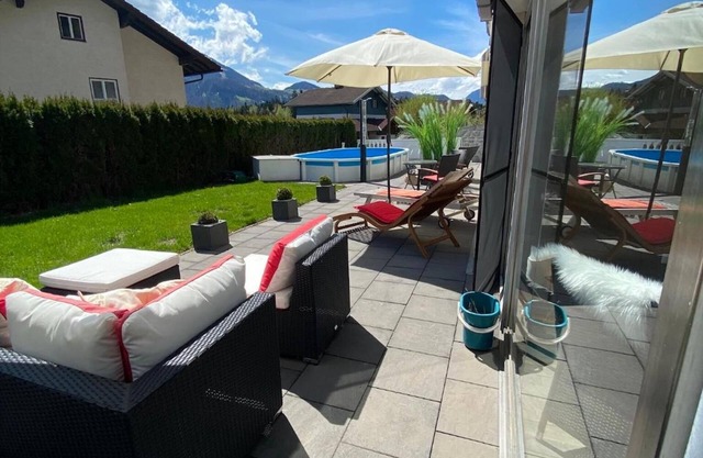 Apartamento 'Modernes Alpenapartment' con vistas a la montaña, piscina privada y Wi-Fi