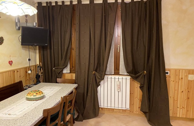 Apartamento "Sulle Piste Da Sci" con vistas a la montaña y jardín compartido