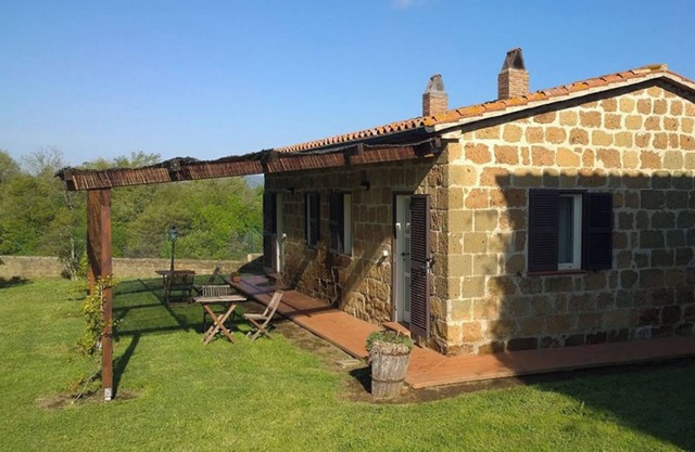 Apartamento 'Pollaio' con piscina compartida, terraza privada y jardín compartido