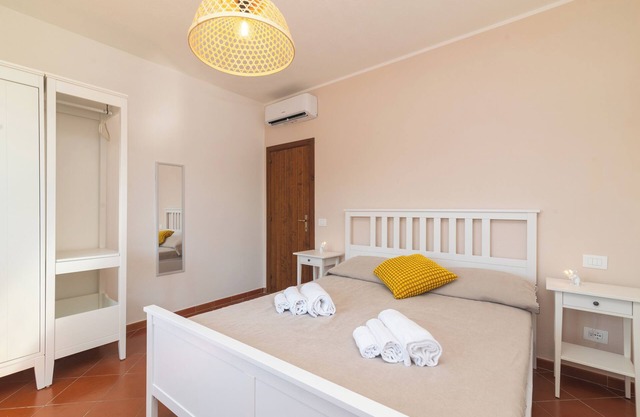 Apartamento 'Relax Porto Mannu' con vistas al mar, Wi-Fi y aire acondicionado