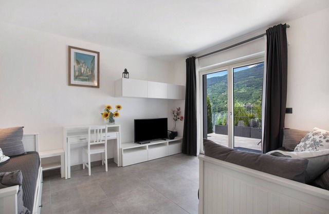Apartamento 'Residence Soleluna - Orsa Minore' con vistas a la montaña, terraza compartida y Wi-Fi