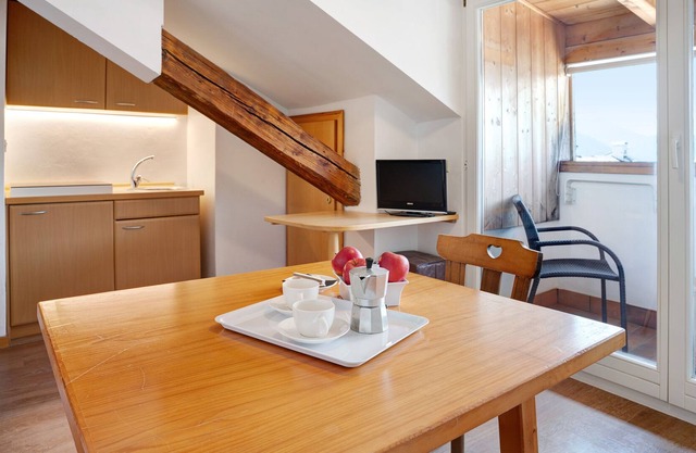 'Roessl Apartment 304' con vistas a la montaña, piscina compartida y Wi-Fi