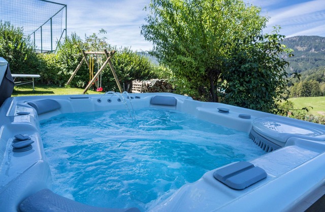 Apartamento "Roessl 200" con vistas a la montaña, piscina compartida y Wi-Fi