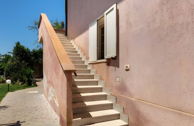Apartamento 'Rosa Dei Venti' con piscina compartida, Wi-Fi y aire acondicionado