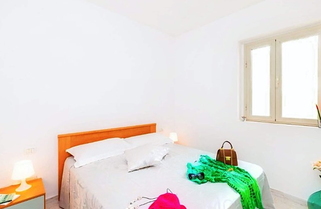 Apartamento 'Sabbia D'oro, 402' con piscina compartida y Wi-Fi