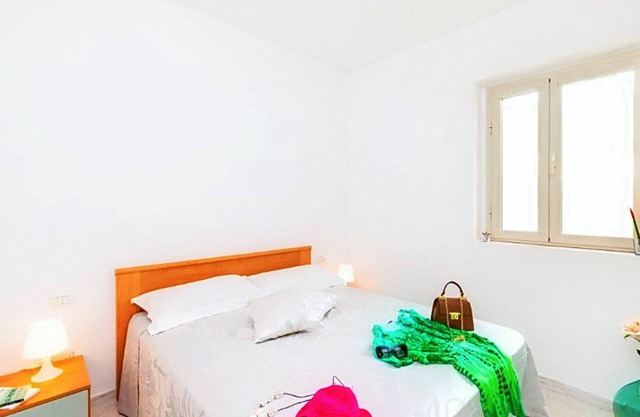 Apartamento 'Sabbia d'oro, 509' con piscina comunitaria y Wi-Fi