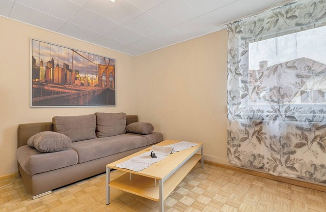 Apartamento 'Schrammis Ferienwohnung Mit Balkon' con terraza compartida, jardín privado y Wi-Fi