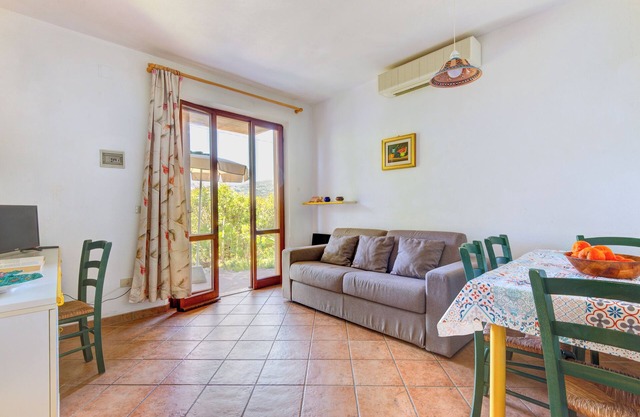 Apartamento 'Trilocale Bonalaccia 1' con piscina compartida y Wi-Fi
