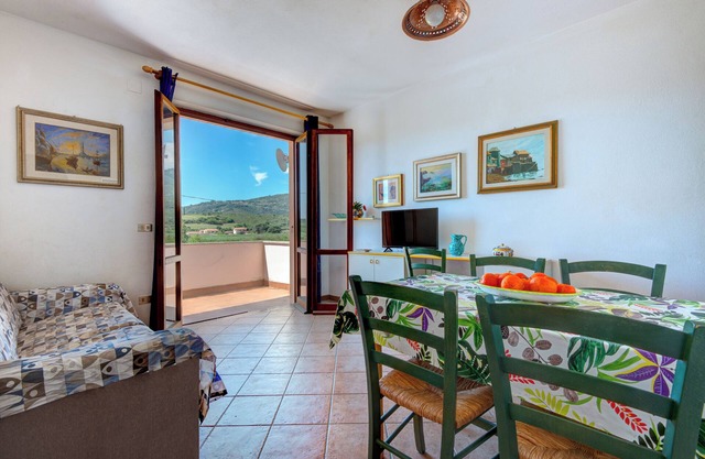 Apartamento 'Trilocale Bonalaccia 2' con piscina compartida, terraza privada y Wi-Fi