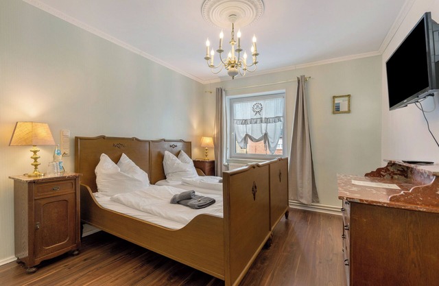 Apartamento 'Überfahrtsalon' con jardín compartido y Wi-Fi