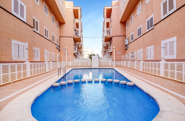 Apartamento 'Verano Azul' con piscina compartida, Wi-Fi y aire acondicionado