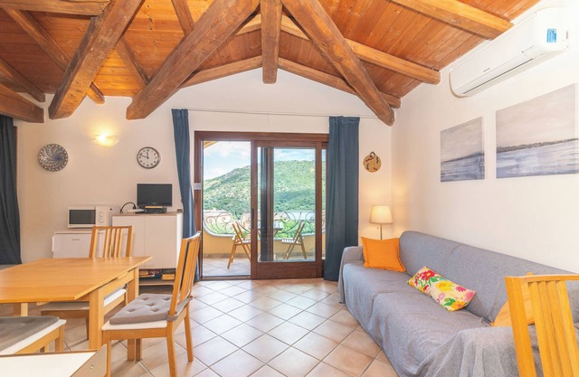 Apartamento 'Vista Mare Tiriddò' con vistas al mar, piscina compartida y aire acondicionado