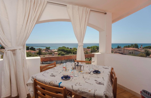 Apartamento "Vista Mare" cerca de la playa con vistas al mar, balcón y jardín