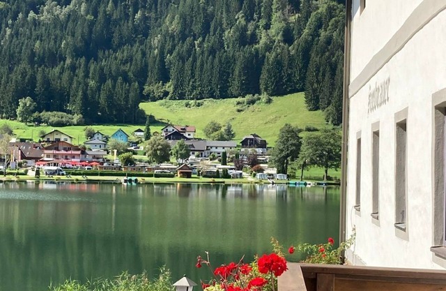 Apartment with balcony, bedroom, lake view 11 - Aparthotel Seebrauer am Afritzer